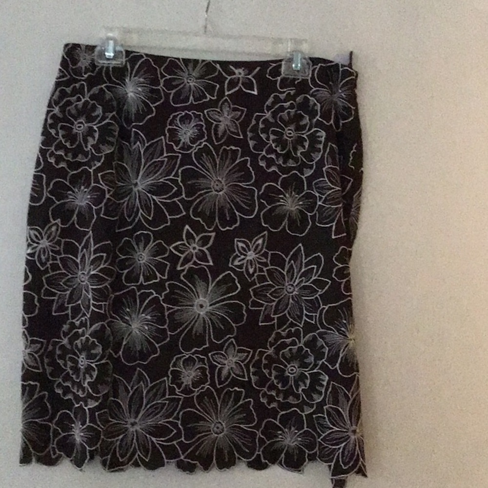 Beautiful embellished brown an white skirt.